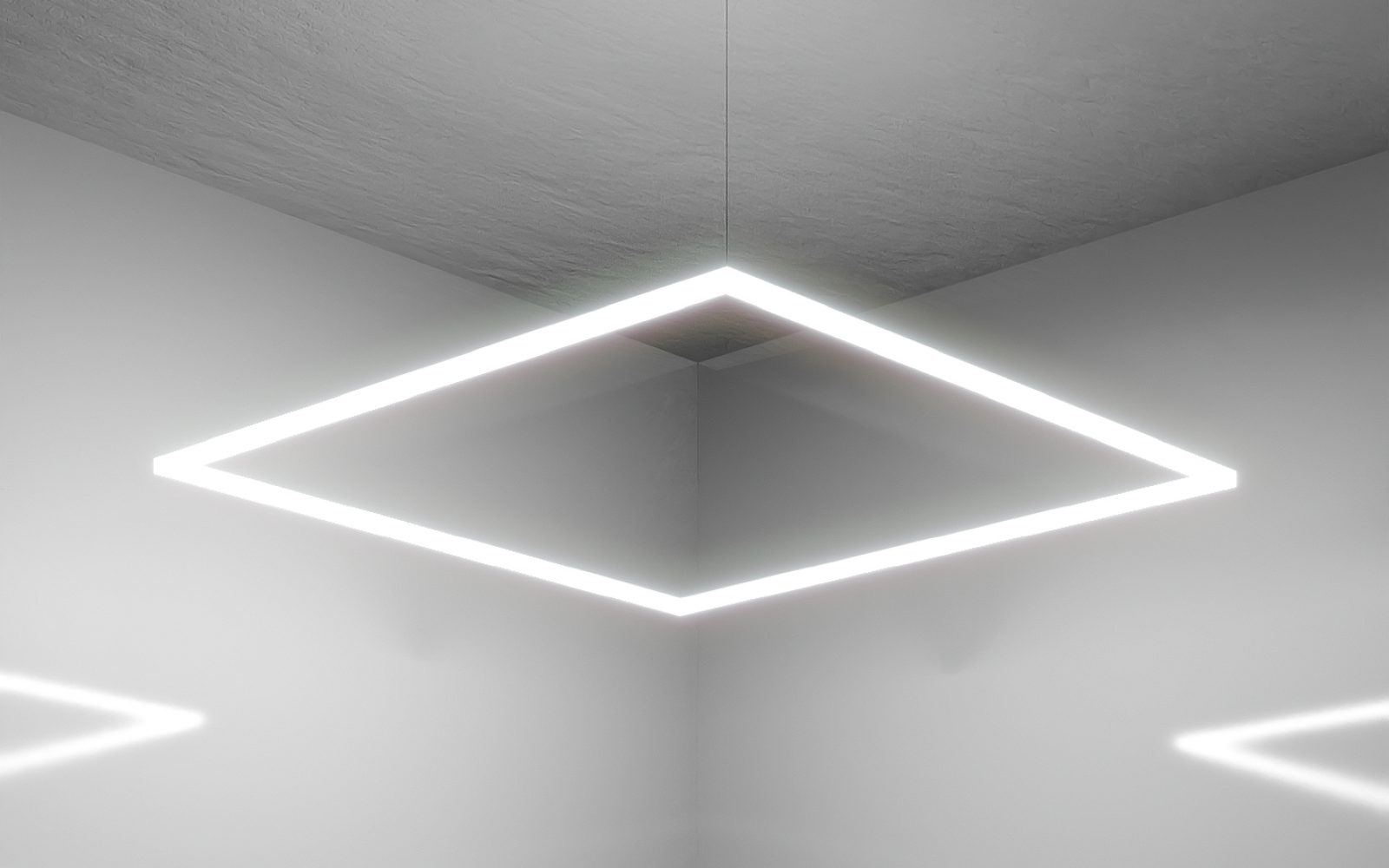 Quadratische LED-Designerleuchte TheQ in minimalistischem Raum